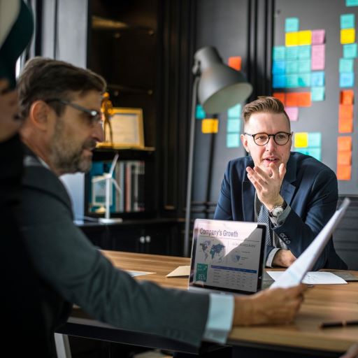 Two men consulting in a meeting