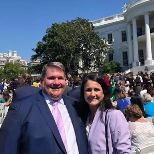 Chuck Ingoglia standing in front of the White House with a colleague