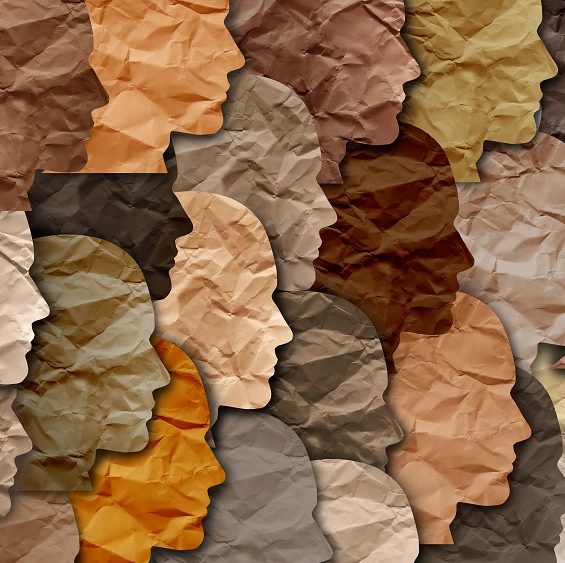 silhouettes of diverse faces made out of paper