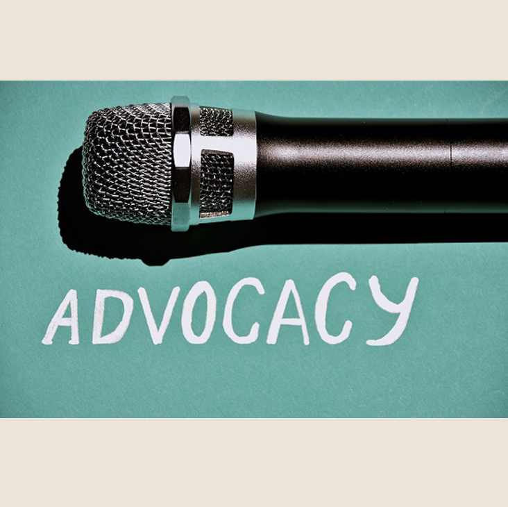 microphone with the word advocacy written below it