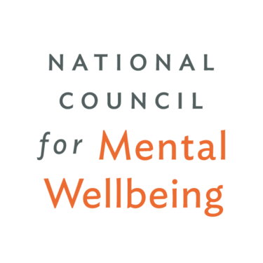 NCMW_Logo_Vertical_Reverse-01