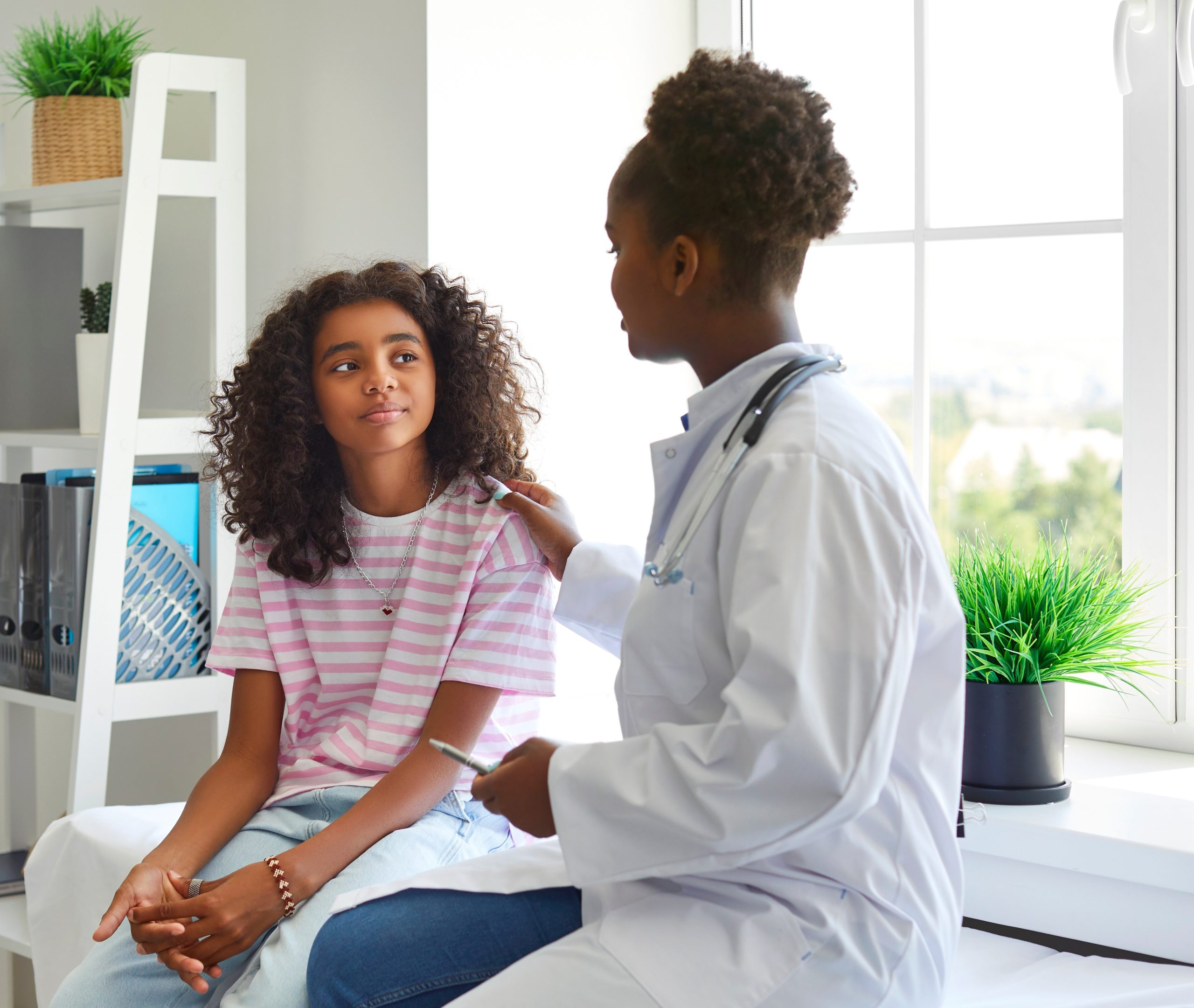 young girl with doctor