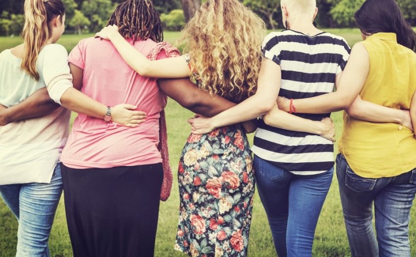 americans joining arms to celebrate mental health awareness month