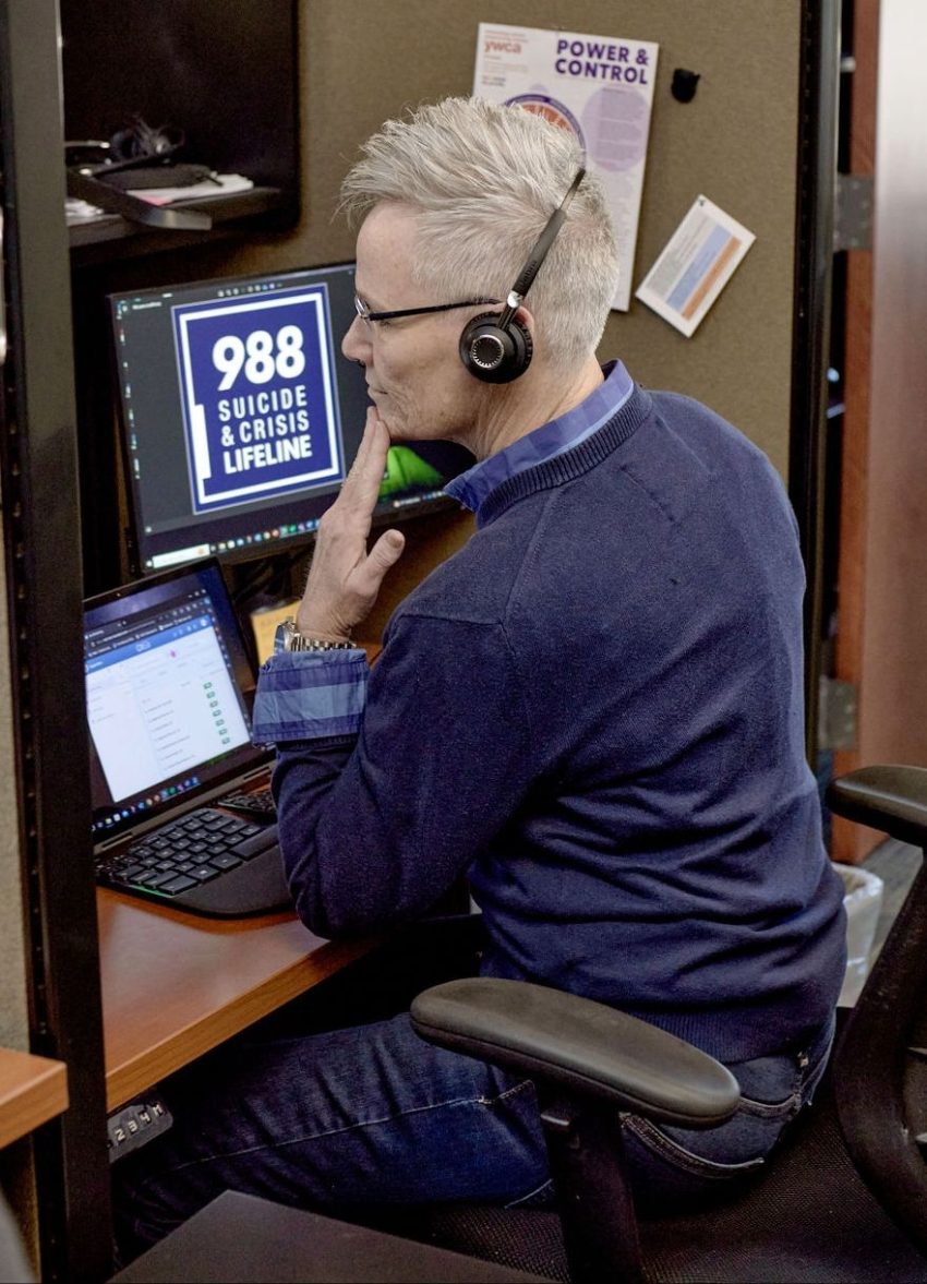 a frontier behavioral health behav988 operator works the phone line