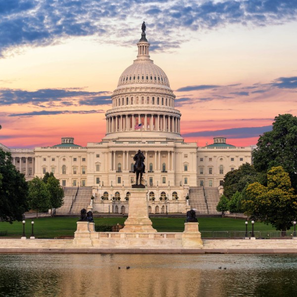 the us capitol building at sunset