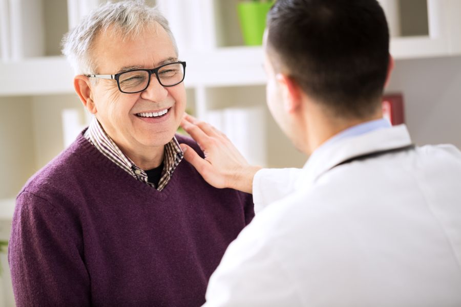 a provider speaks with a patient