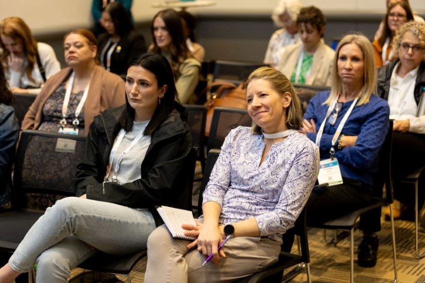 natcon attendees listen to a presentation